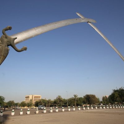 A picture taken on June 3, 2019 shows the Victory Arch known as the Swords of Qadisiyah, to mark Iraq's war against Iran, in Baghdad's high-security Green Zone. The Green Zone, home to the Iraqi parliament and US embassy, fully reopened to traffic around the clock today, the government said. It has been heavily fortified since the US-led invasion that overthrew dictator Saddam Hussein in 2003, with nearly all Iraqis denied access to its 10 square kilometres. (Photo by AHMAD AL-RUBAYE / AFP)